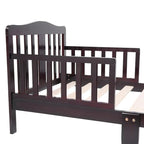 Lit d'enfant en bois avec barrières de sécurité