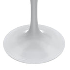 Table à manger ronde avec plateau en résine et piètement colonne en acier blanc