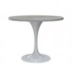 Table à manger ronde avec plateau en résine et piètement colonne en acier blanc