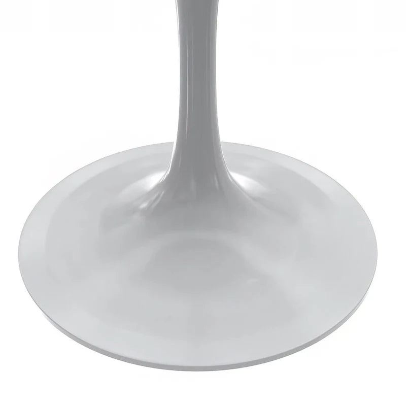 Table à manger ronde avec plateau en résine et piètement colonne en acier blanc